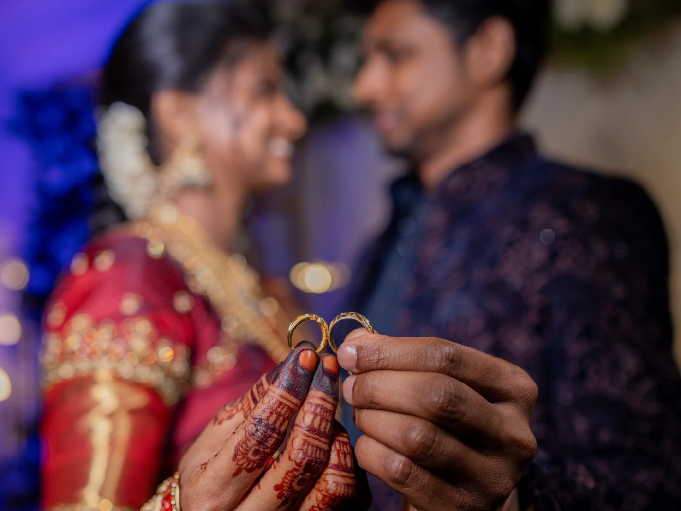 Keerthivasan and Shenbaka Priya holding their engagement rings